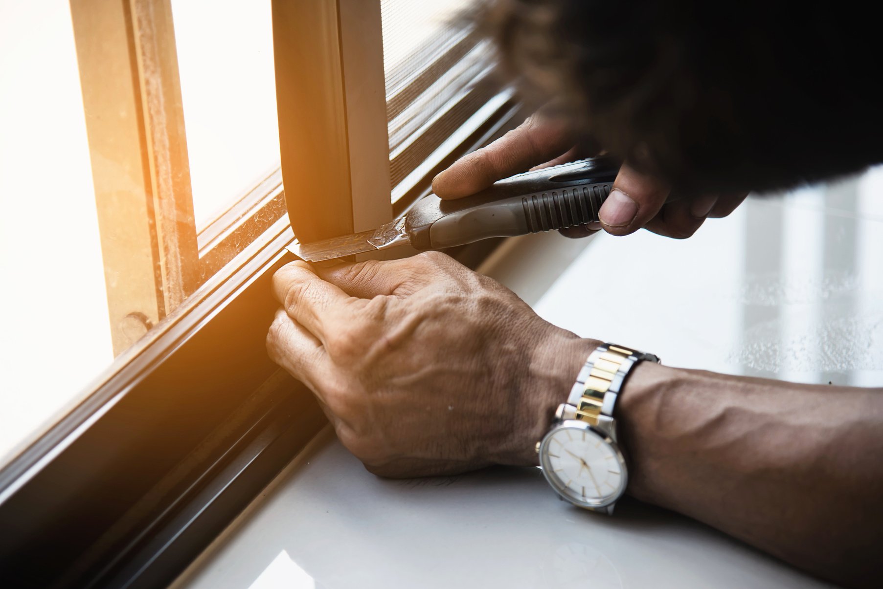 Man Doing Aluminum Frame with Glasses and Wire Screen Door